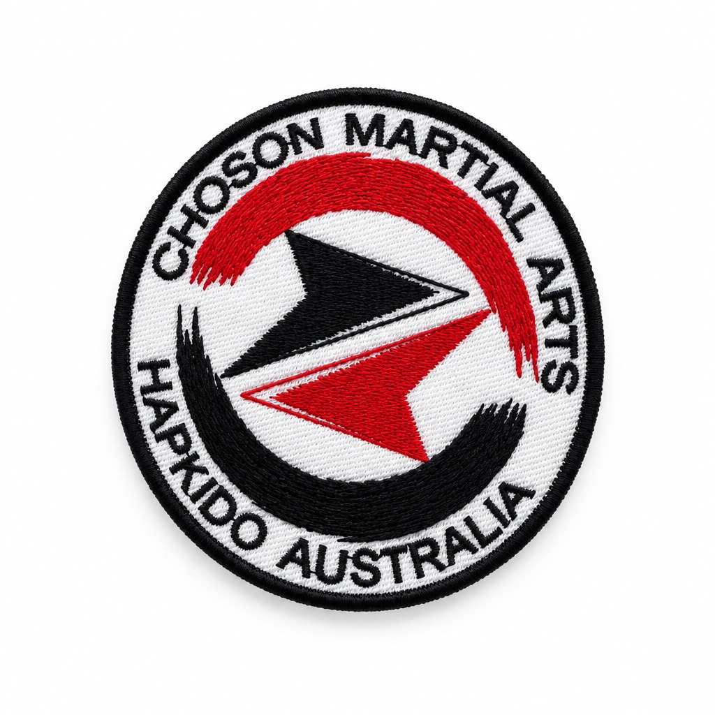Embroidered Choson Martial Arts Hapkido Australia patch, red and black wave over the arrow mark on white